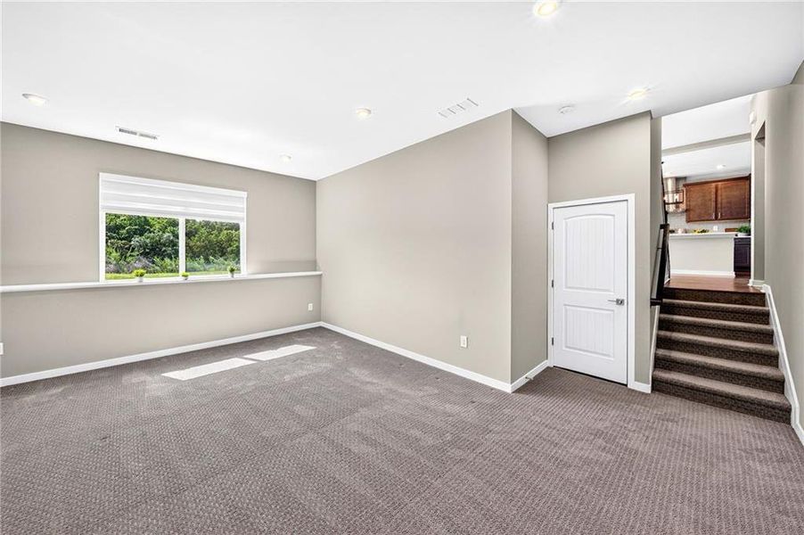 Spacious, unfurnished interior of a new home in The Reserve At Liberty Park, Braselton (Image 38).