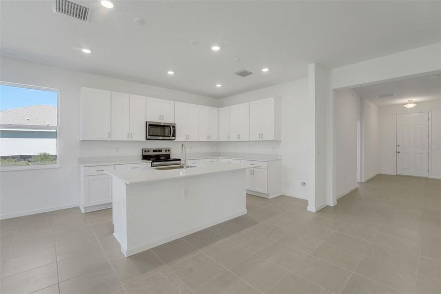 Furnished interior view inside a new home in Willowbrook North, Winter Haven (Image 13).