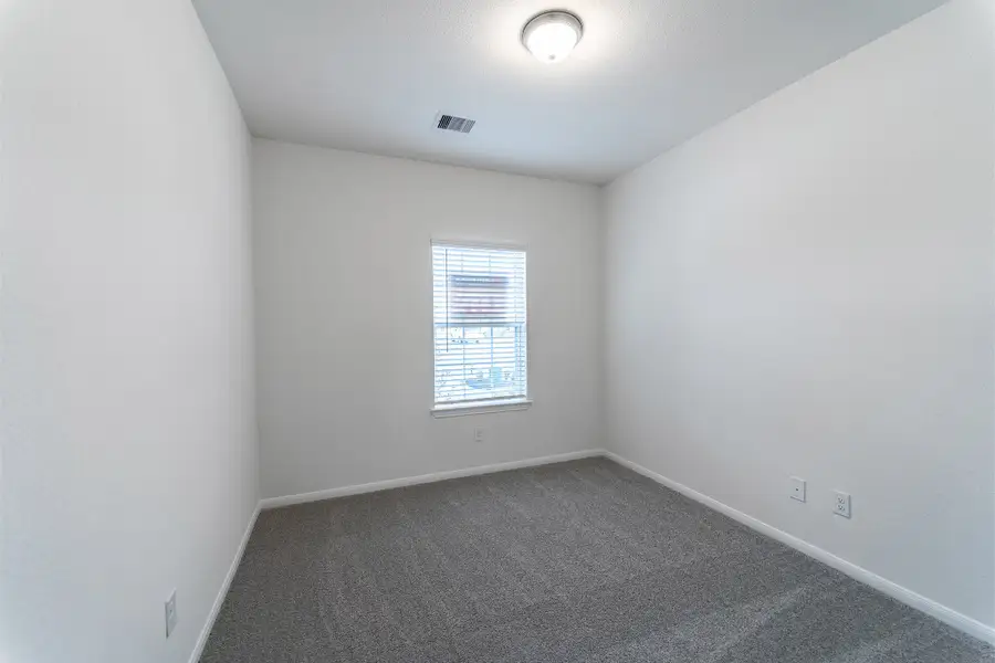 Spacious, unfurnished interior of a new home in Windrose Green, Angleton (Image 21).
