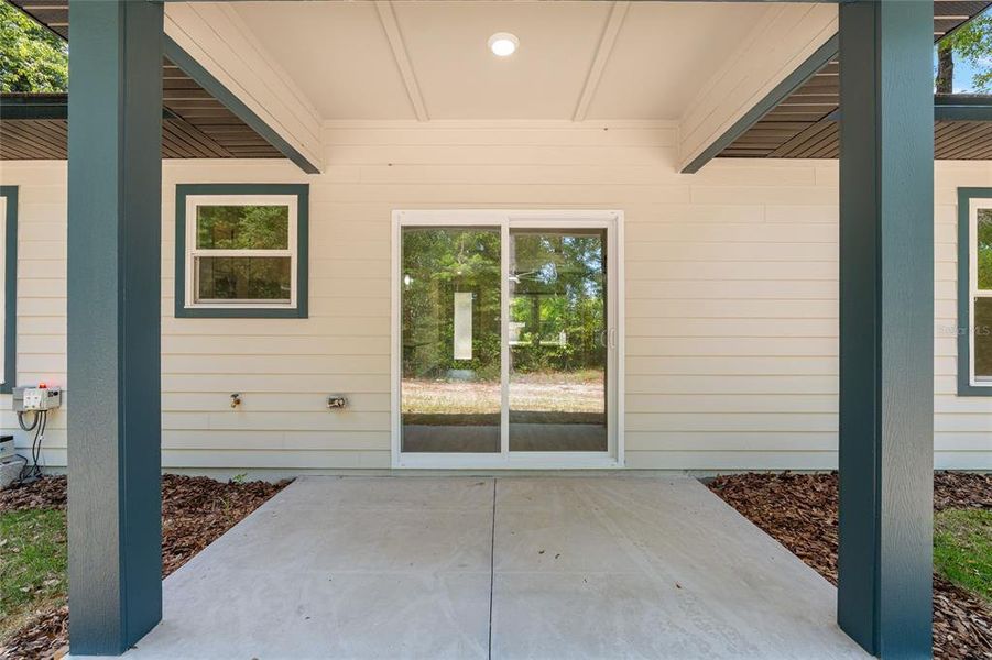 Exterior details and patio area of a home in , Fort White (Image 34).