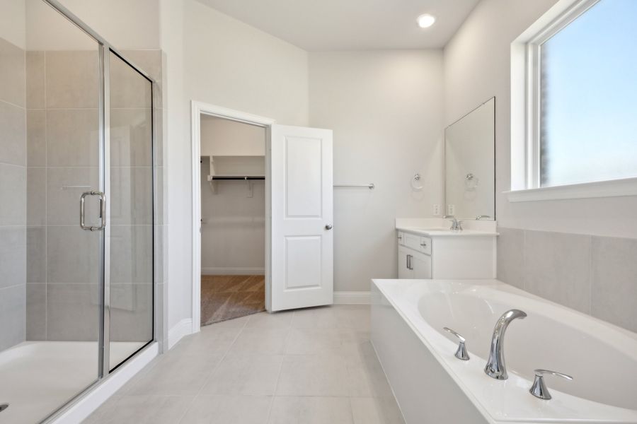 Representative furnished interior of a home built from the Waverly III by Megatel Homes in Bellagio, Forney (Image 5).