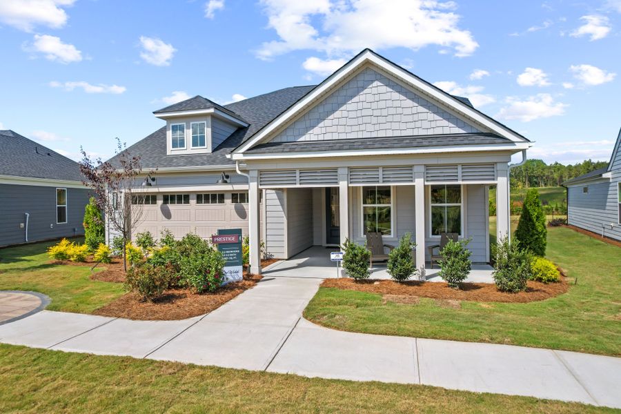 Representative exterior photo of a completed home built from the Prestige by Del Webb in Carolina Riverside, Belmont, NC (Image 20).