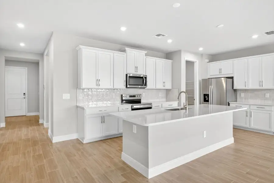 Furnished interior view inside a new home in Windwater, Parrish (Image 2).