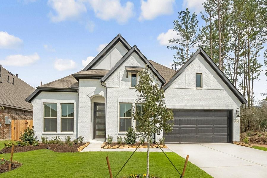 Front exterior of a new home in , Cypress, TX, highlighting curb appeal (Image 2). Front exterior of a new home in , Cypress, TX, highlighting curb appeal (Image 2).