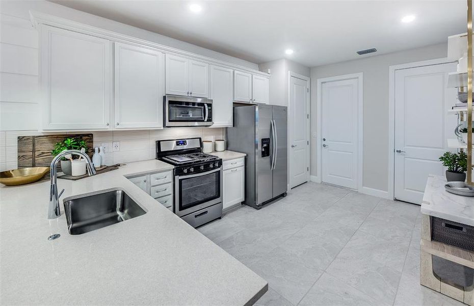 Furnished interior view inside a new home in BeachWalk by Manasota Key, Englewood (Image 18).