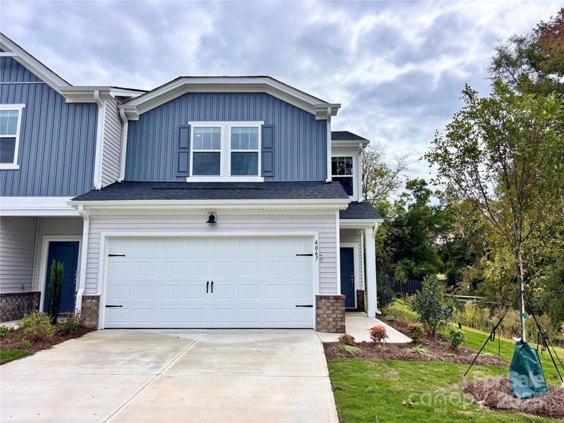 Front exterior of a new home in Galloway Ridge, Charlotte, NC, highlighting curb appeal (Image 1). Front exterior of a new home in Galloway Ridge, Charlotte, NC, highlighting curb appeal (Image 1).