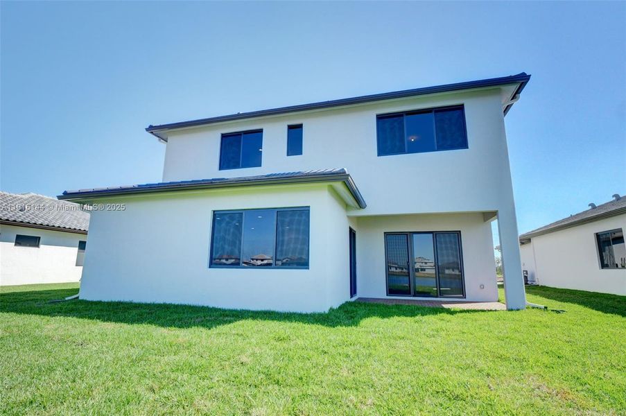 Exterior details and patio area of a home in , Ave Maria (Image 4).