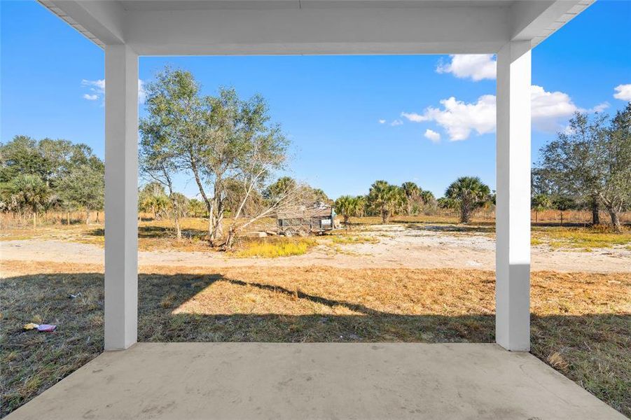 Exterior details and patio area of a home in , Okeechobee (Image 29).