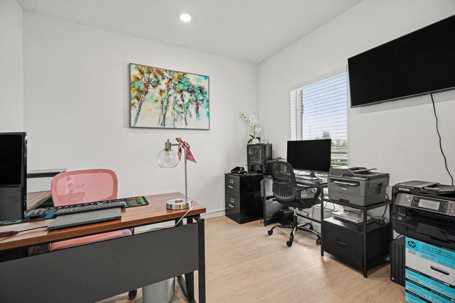 Private study with glass French doors, abundant natural light, and flexibility for a home office, hobby room, or additional living space. Private study with glass French doors, abundant natural light, and flexibility for a home office, hobby room, or additional living space.