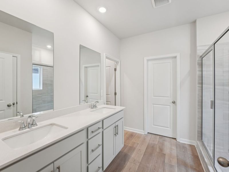 Furnished interior view inside a new home in Northwoods at Mirror Lake, Villa Rica (Image 10).