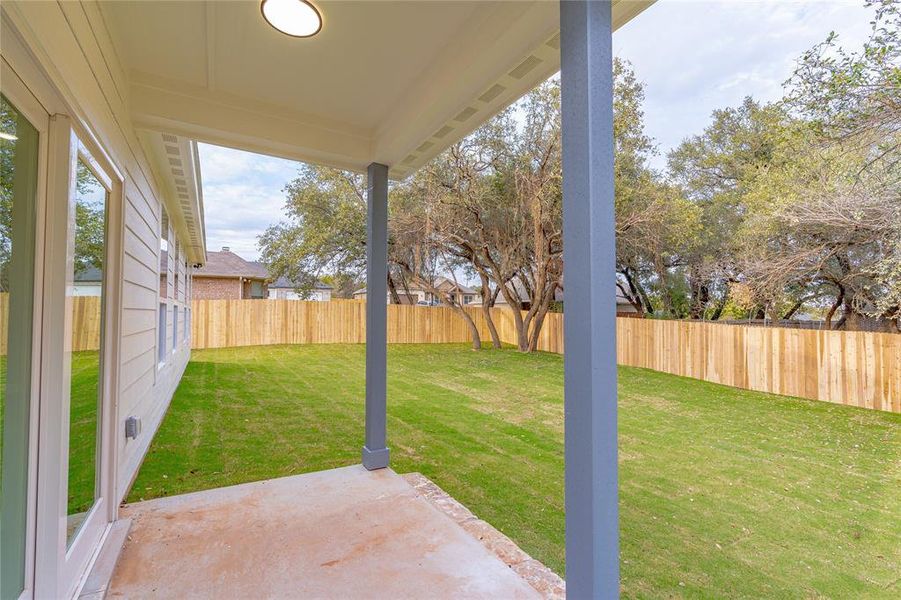 View of yard with a patio area