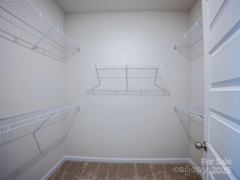 Primary closet - Photo is representational