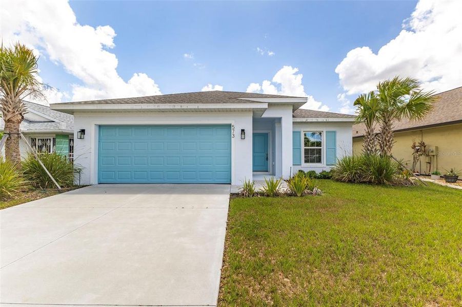 Front exterior of a new home in , Port Charlotte, FL, highlighting curb appeal (Image 23).