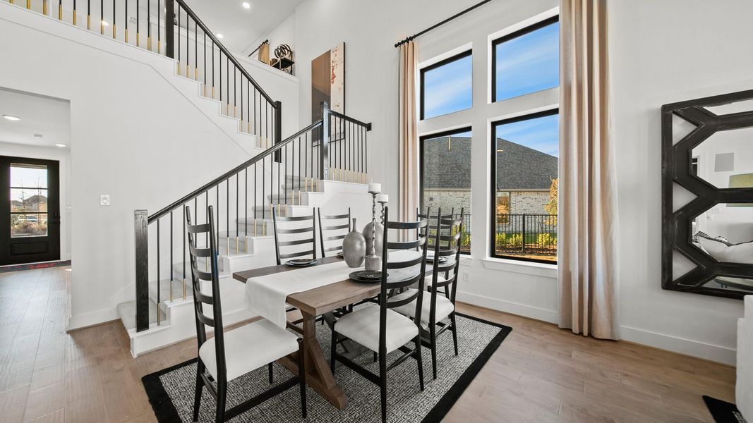 Impressive staircase is ideally situated in the center of the home, with open wrought-iron railing leading into the gameroom. Impressive staircase is ideally situated in the center of the home, with open wrought-iron railing leading into the gameroom.