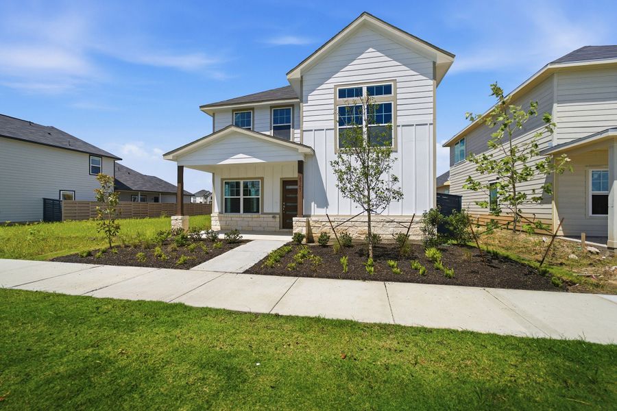 Front exterior of a new home in Austin Point, Richmond, TX, highlighting curb appeal (Image 26).