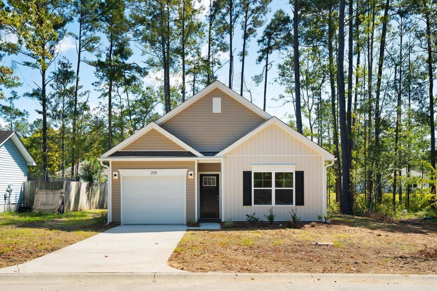 Front exterior of a new home in , North Charleston, SC, highlighting curb appeal (Image 1).