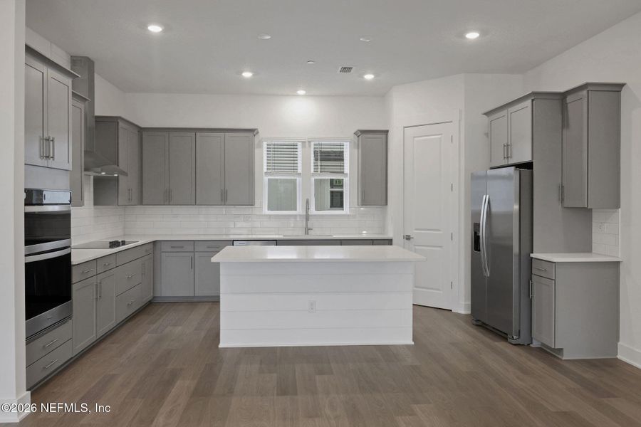 Furnished interior view inside a new home in North Beach Townhomes, Jacksonville Beach (Image 13).