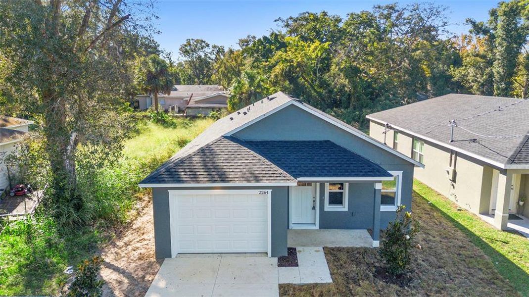 Front exterior of a new home in , Eustis, FL, highlighting curb appeal (Image 19).