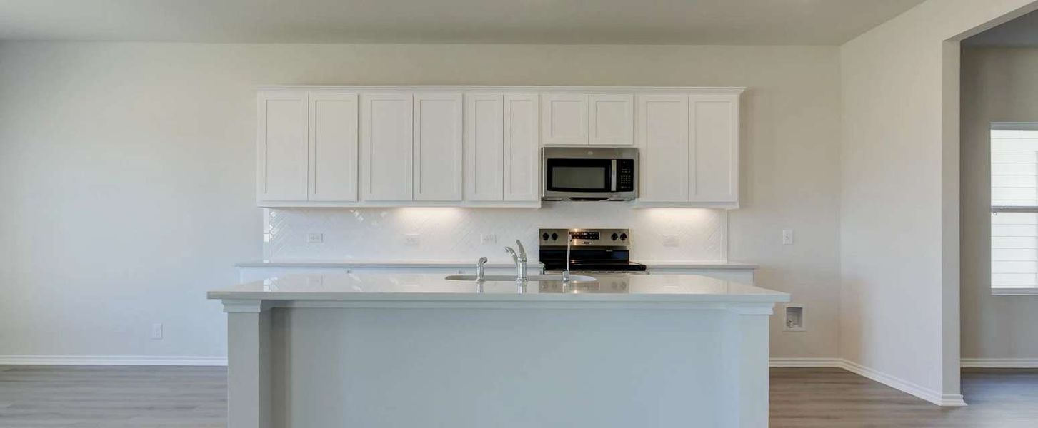 Representative furnished interior of a home built from the Placid by Ashton Woods in Hennersby Hollow, San Antonio (Image 6).