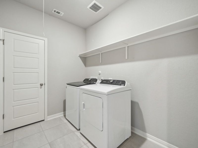 Laundry room in the Briscoe floorplan at a Meritage Homes community. Laundry room in the Briscoe floorplan at a Meritage Homes community.