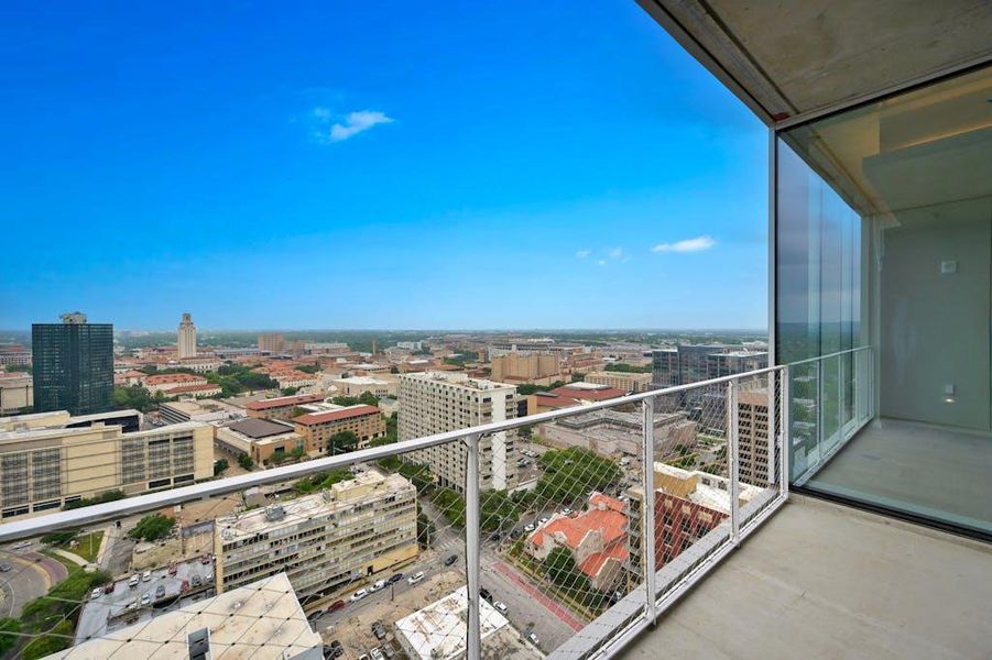 Just blocks from the Linden, the University of Texas Tower rises proudly over campus life—an enduring symbol of academic excellence and Austin's vibrant energy. Whether you're enjoying a walk through campus, catching a lecture, or taking in the seasonal blooms along Guadalupe Street, this historic landmark places the best of UT and downtown within easy reach... (Photo taken from 25th floor.) Just blocks from the Linden, the University of Texas Tower rises proudly over campus life—an enduring symbol of academic excellence and Austin's vibrant energy. Whether you're enjoying a walk through campus, catching a lecture, or taking in the seasonal blooms along Guadalupe Street, this historic landmark places the best of UT and downtown within easy reach... (Photo taken from 25th floor.)