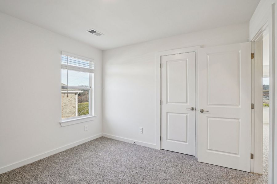 Spacious, unfurnished interior of a new home in Mansker Farms - Bronze Series, Hendersonville (Image 15).