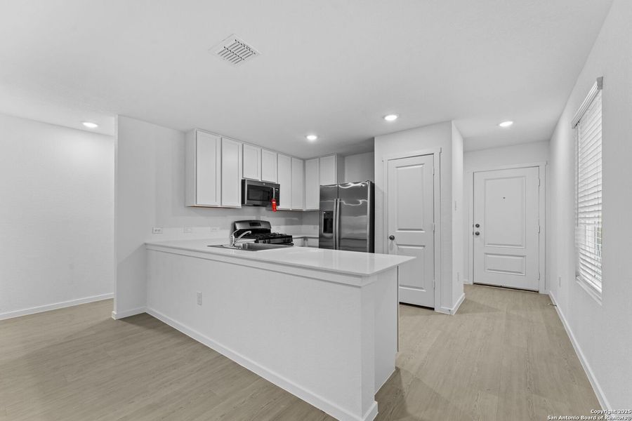 Furnished interior view inside a new home in Torian Village: Belmar Collection, San Antonio (Image 5).