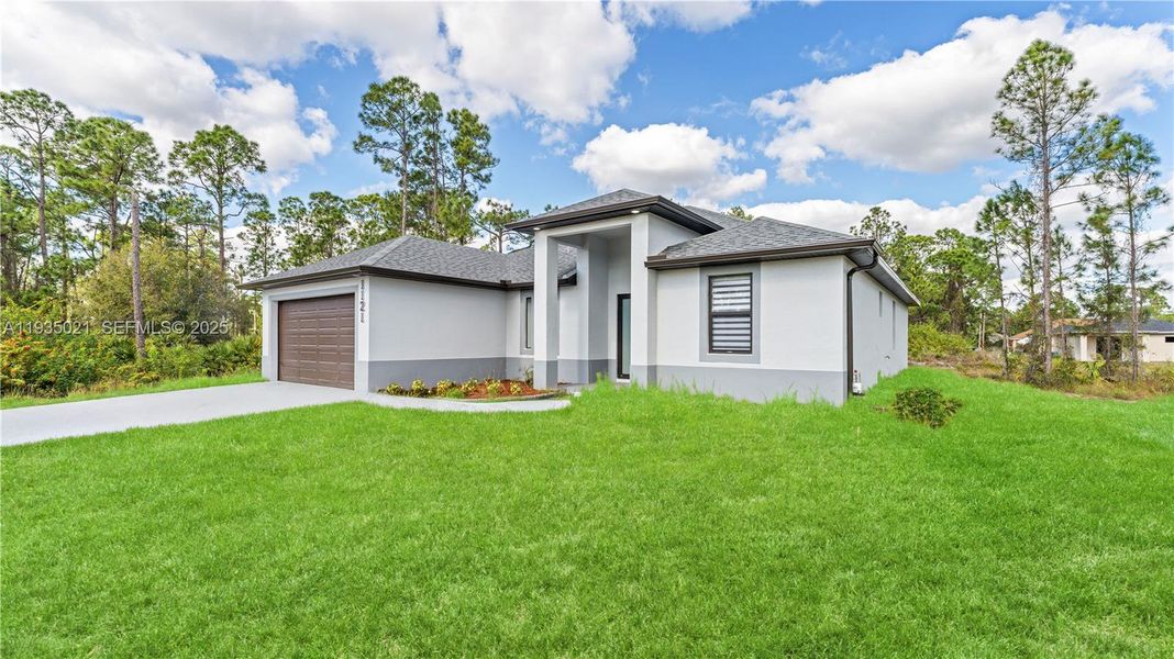Front exterior of a new home in , Lehigh Acres, FL, highlighting curb appeal (Image 18).