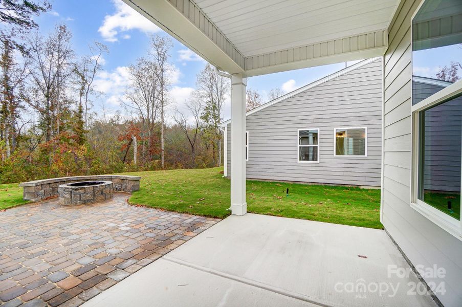 Covered Porch with Paver Patio and Firepit