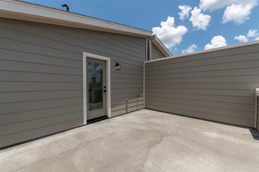 Exterior details and patio area of a home in , Houston (Image 4). Exterior details and patio area of a home in , Houston (Image 4).