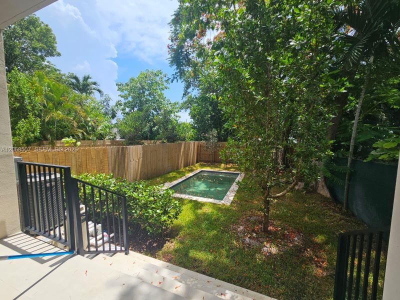 Exterior details and patio area of a home in , Miami (Image 2). Exterior details and patio area of a home in , Miami (Image 2).