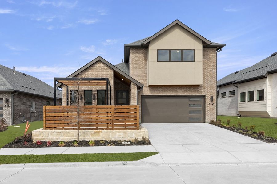 Front exterior of a new home in Willow Grove Single-Family Homes, Melissa, TX, highlighting curb appeal (Image 2). Front exterior of a new home in Willow Grove Single-Family Homes, Melissa, TX, highlighting curb appeal (Image 2).