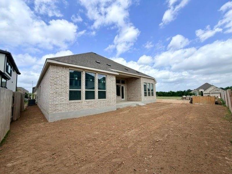 Exterior details and patio area of a home in Hawkes Landing, Leander (Image 5).