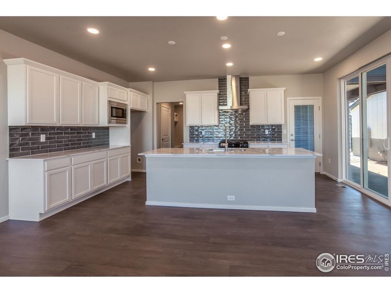 Furnished interior view inside a new home in Trailside Alley Load - Single Family Homes, Timnath (Image 10).