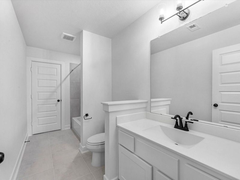 Furnished interior view inside a new home in Brookewater, Rosenberg (Image 4).
