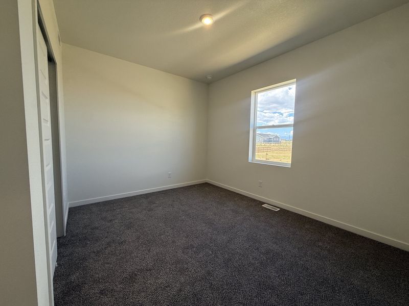 Spacious, unfurnished interior of a new home in Granary, Johnstown (Image 27).