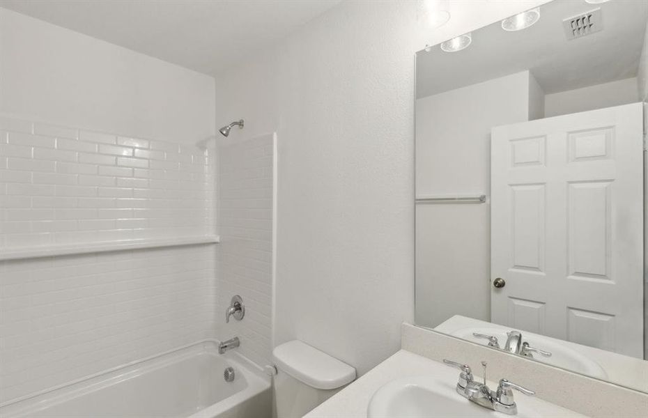 Upgraded secondary bathroom *real home pictured