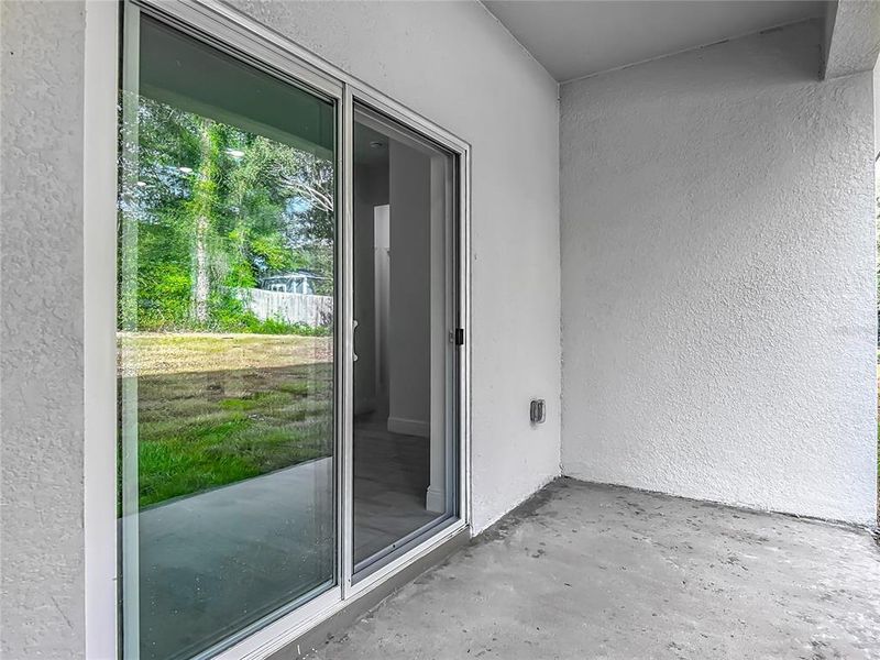 Exterior details and patio area of a home in , Citrus Springs (Image 4).