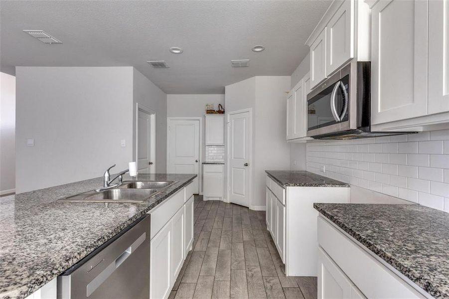 Furnished interior view inside a new home in Springhill South, Boyd (Image 3). Furnished interior view inside a new home in Springhill South, Boyd (Image 3).