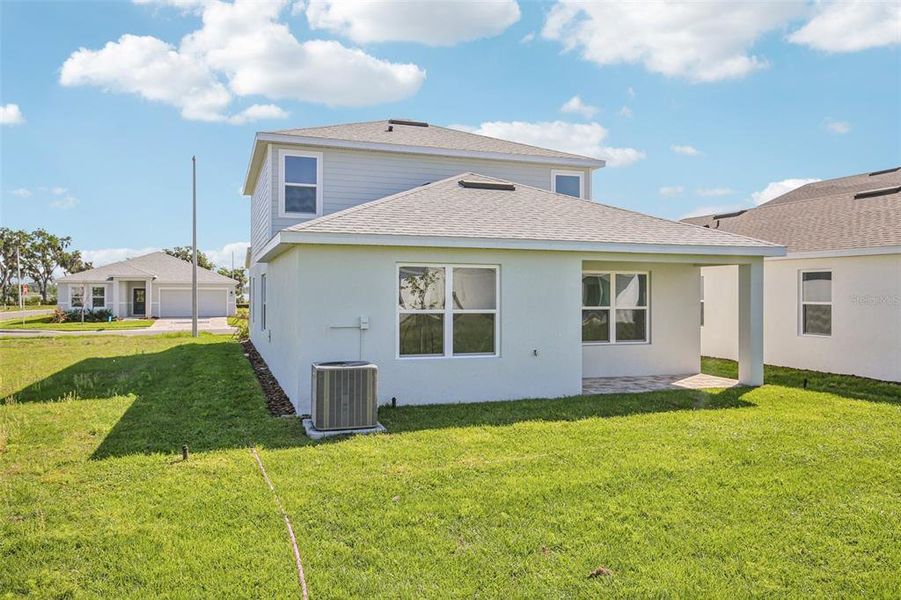Exterior details and patio area of a home in Willowbrook North, Winter Haven (Image 20).