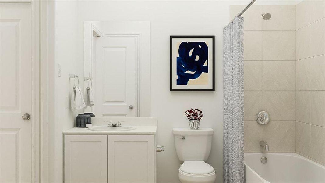 Full bathroom featuring shower / bath combination with curtain, toilet, and vanity