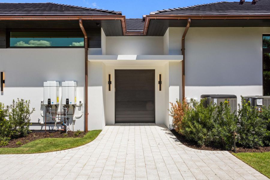 Front exterior of a new home in , Jupiter, FL, highlighting curb appeal (Image 33).