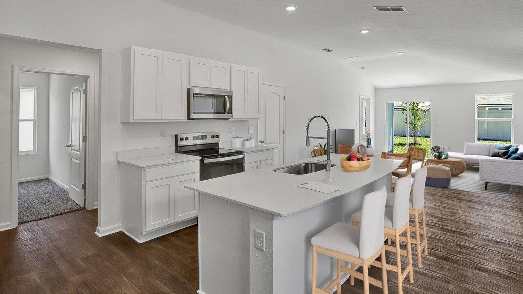 Representative furnished interior of a home built from the Adele+ by D.R. Horton in Liberty Cove, Yulee (Image 5).