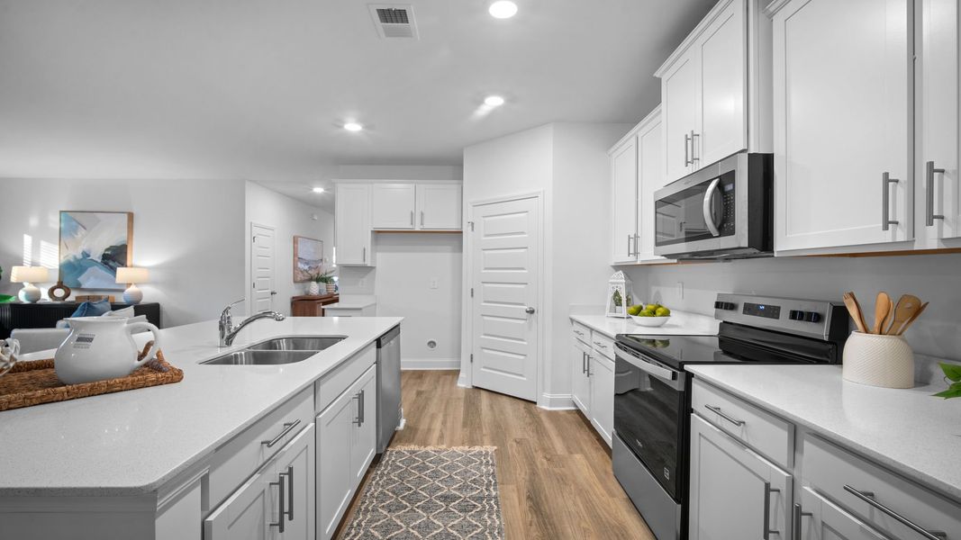 Representative furnished interior of a home built from the Cantey-exp by D.R. Horton in The Lakes at North Glynn, Brunswick (Image 6).