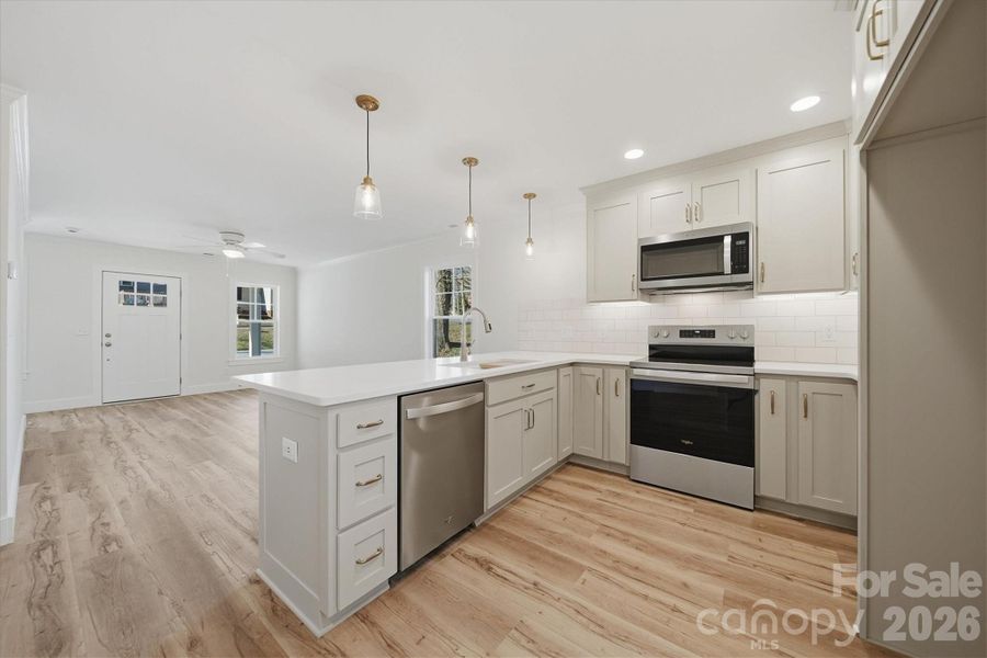 Furnished interior view inside a new home in , Statesville (Image 8).