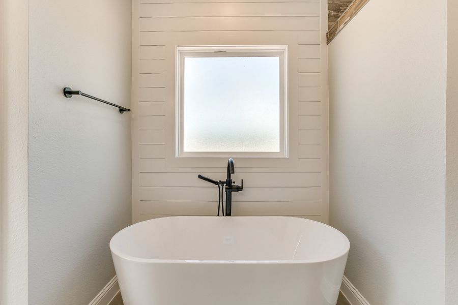 Representative furnished interior of a home built from the Abrams by Trinity Classic Homes in Freeman Ranch, Weatherford (Image 6).