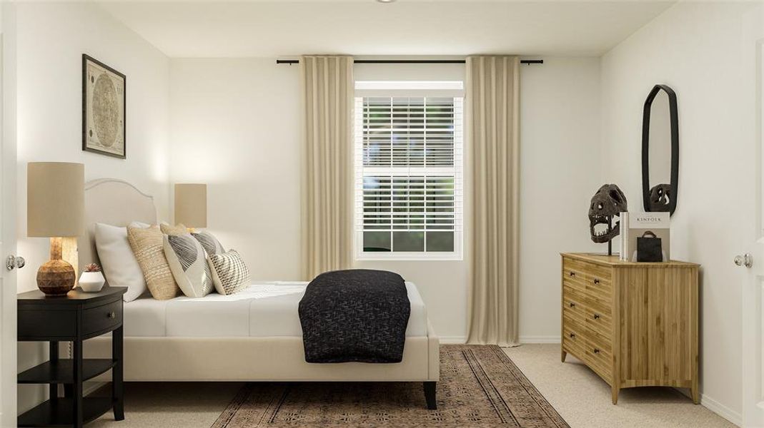 Bedroom with light colored carpet and baseboards Bedroom with light colored carpet and baseboards