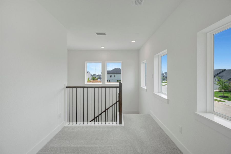 Spacious, unfurnished interior of a new home in Elyson - Grove Row Collection, Katy (Image 31).