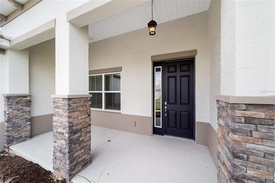 Exterior details and patio area of a home in On Top of the World Communities, Ocala (Image 27).