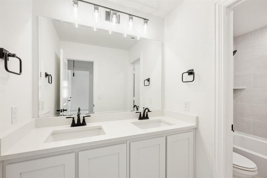 Furnished interior view inside a new home in Painted Tree Woodland District 50, McKinney (Image 11).